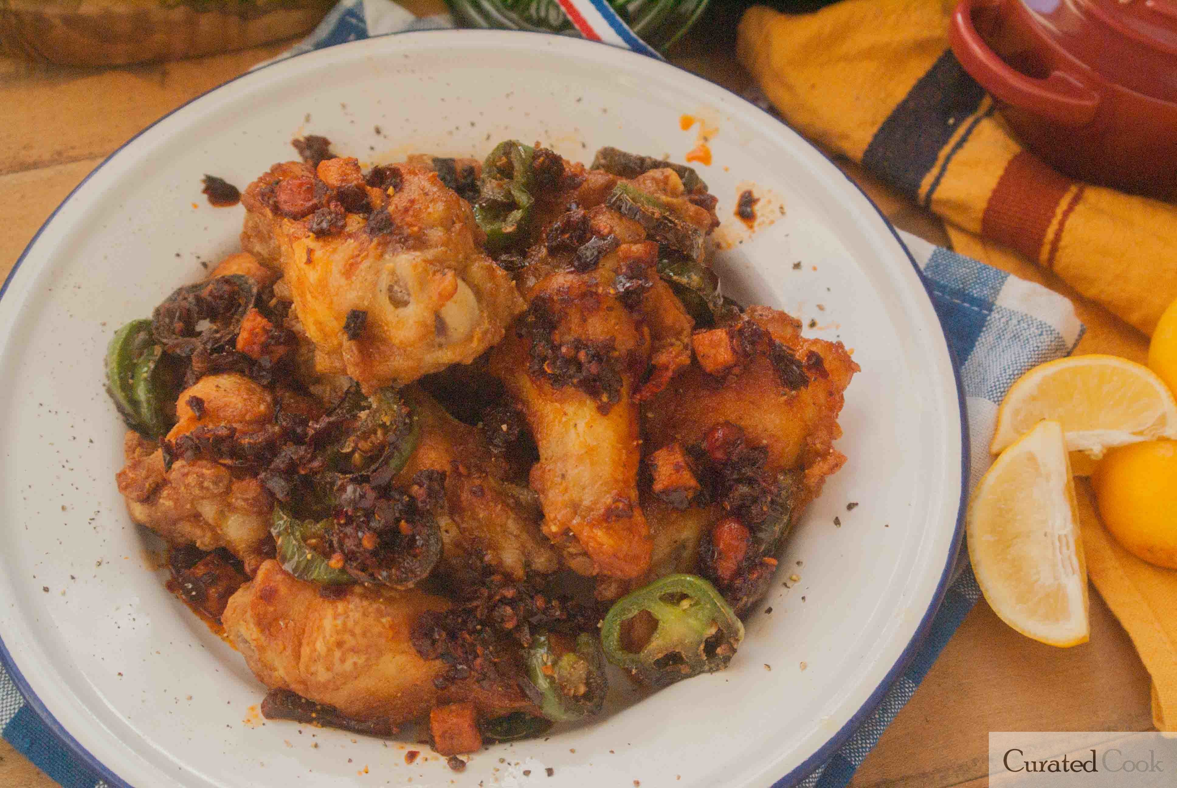 Chicken Wing with curry chili oil and jalapeno