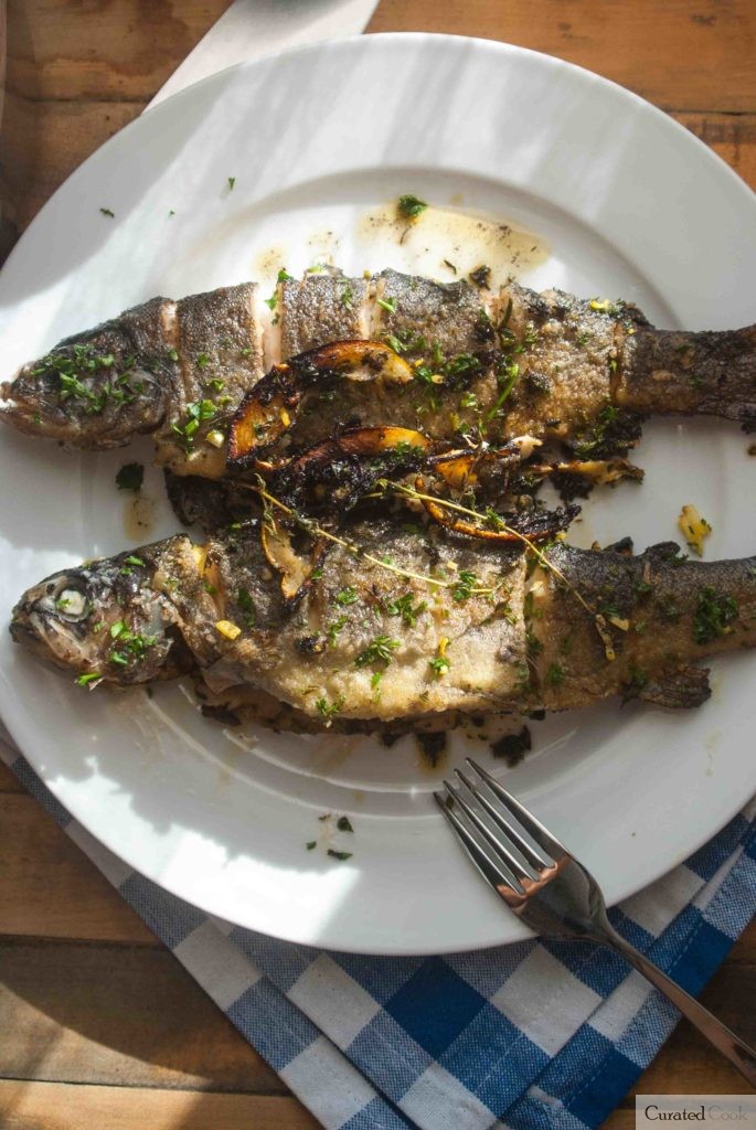 Pan Fried Rainbow Trout Recipe with Herb and Garlic Butter Curated Cook